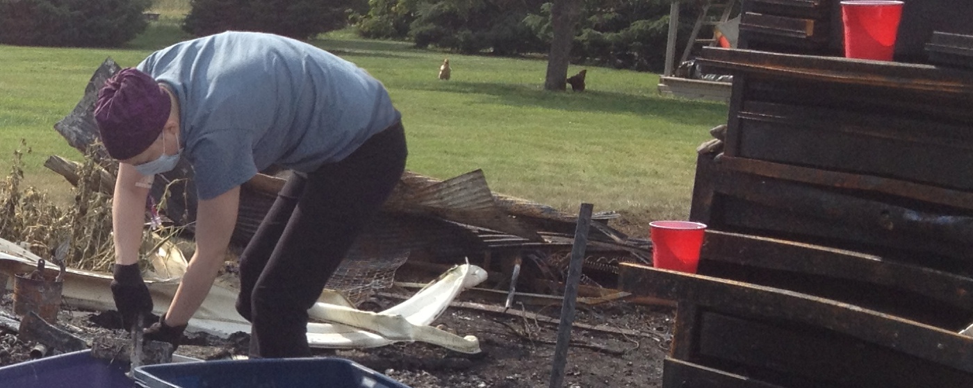 Amanda cleaning up after a friends fire